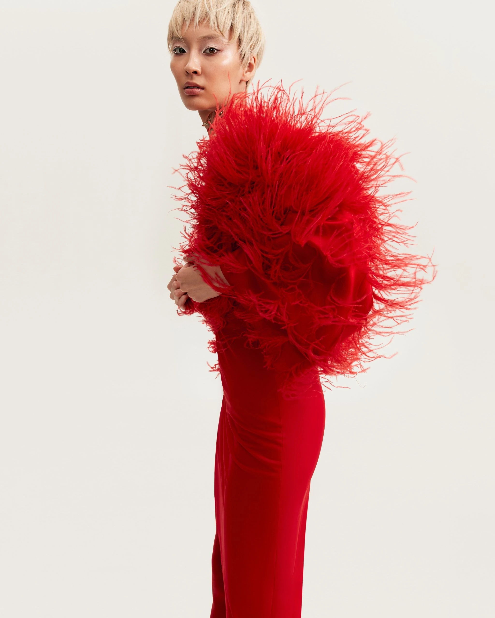 		Bizarre red feather-trimmed coat, Xo Xo	